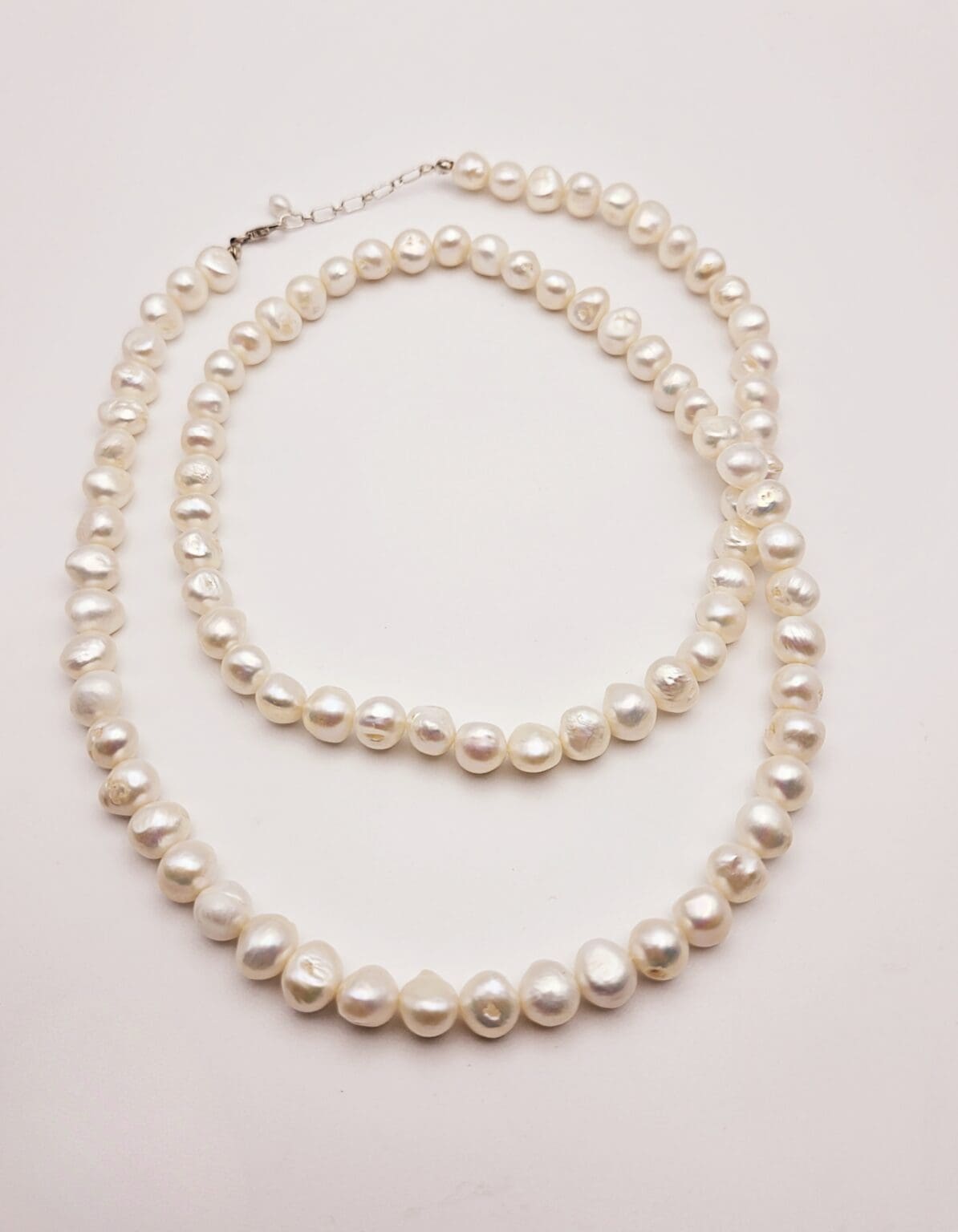 Sterling silver clasped pearl strand necklace